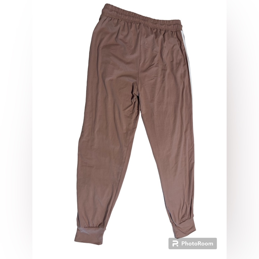 loose sweats that were never worn,dusty pink color with white lines small/medium